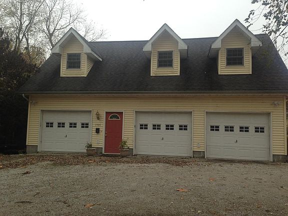 Apartment is upstairs in the detached garage.