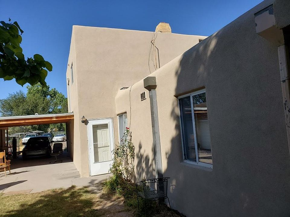 Entrance to unit is through the carport.