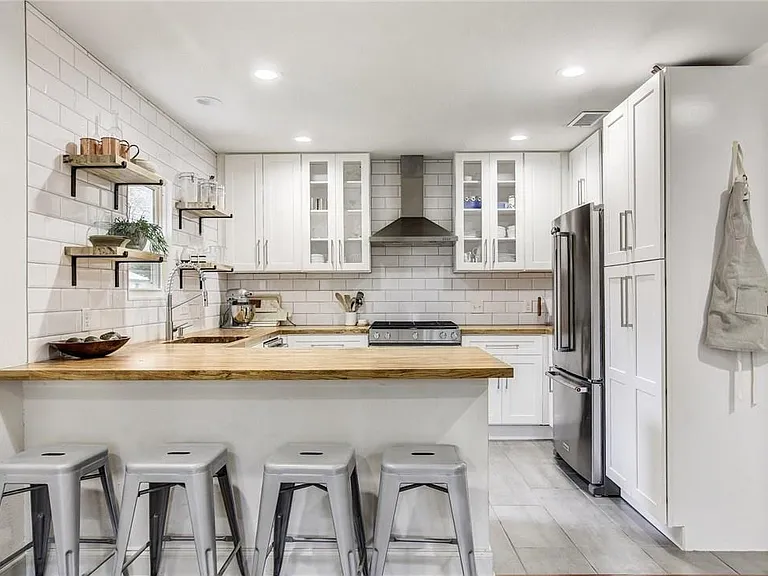Updated Kitchen with New Appliances, Butcher Block Counter tops, Great Storage, Floating Shelves