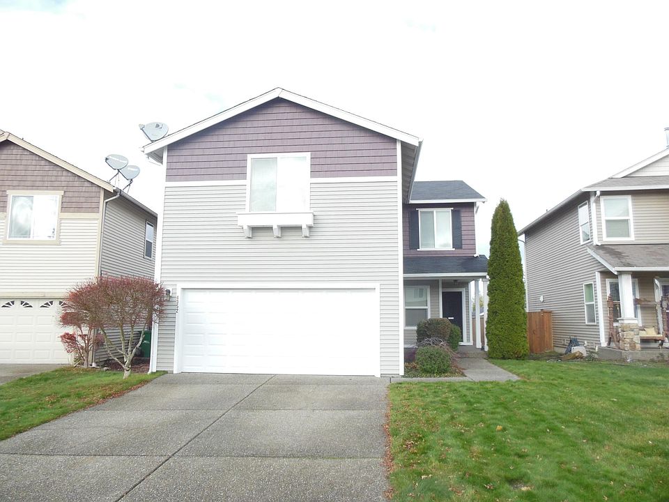 Front of house, two spaces parking garage