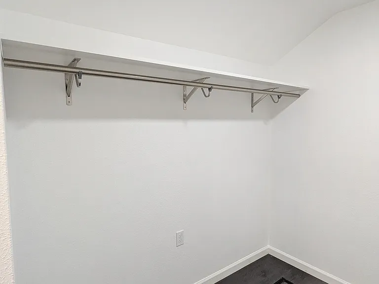 Shelves on top of the racks and plenty of floor space.