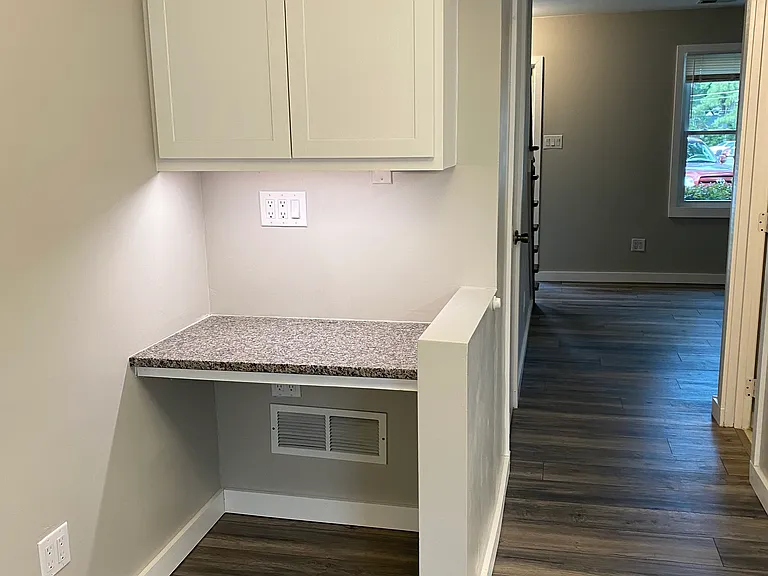 Work-from-home workstation with ample outlets and office cabinet