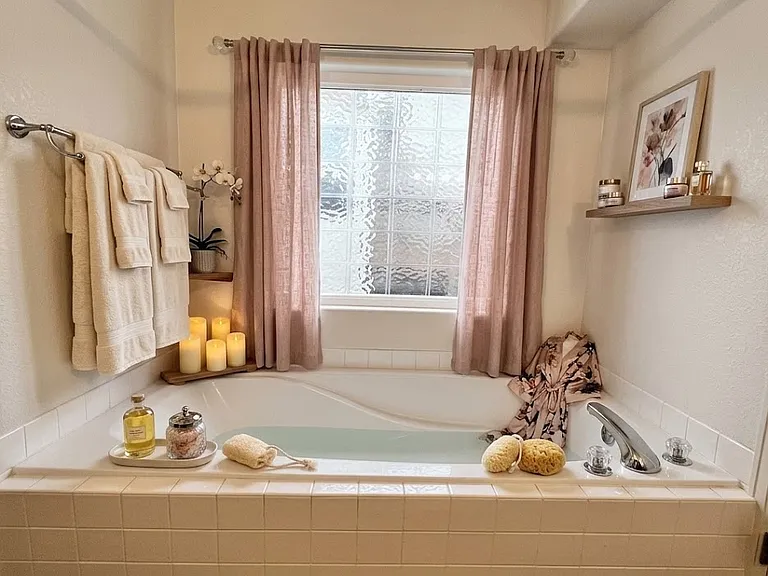 AI decorated bath tub.
NOTE: House is unfurnished, and ONLY artificial-flame candles are permitted.