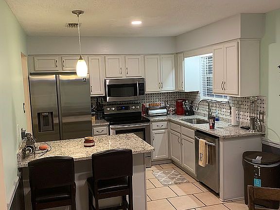 5th image of 6292 Woodside Dr N