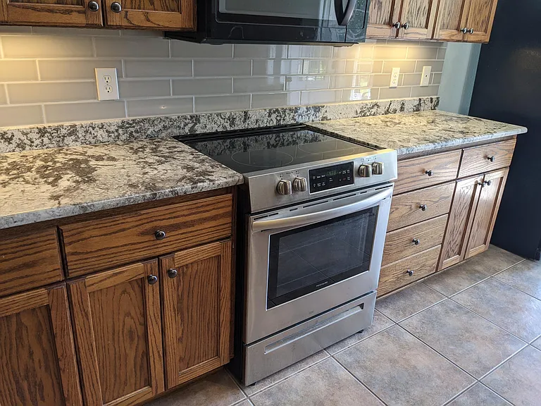 Granite counter tops and new stainless-steel appliance