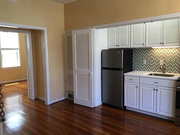 Kitchen w/ view of bedroom