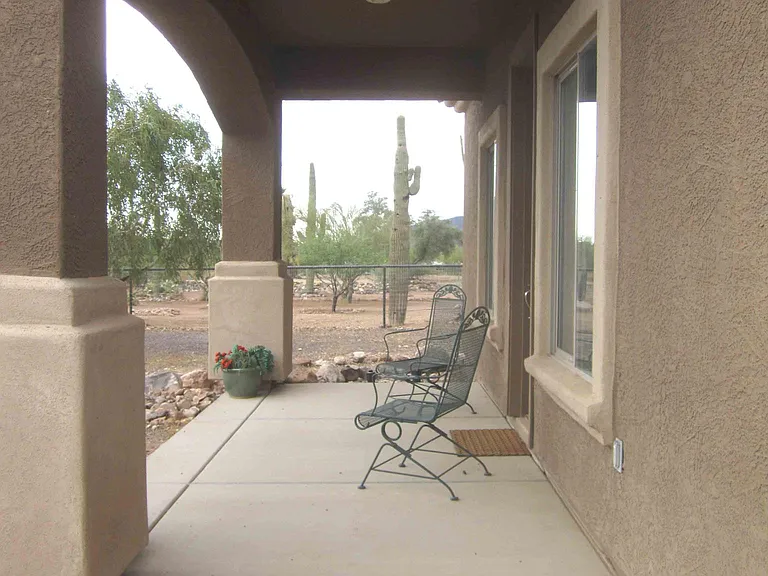 Front Porch Sitting Area, view of sunsets and sundowns.