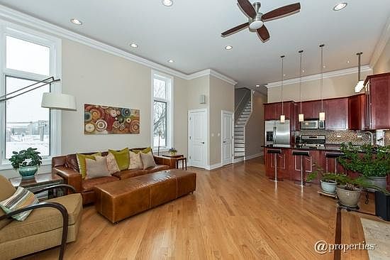 Living Room with 12 ft Ceilings & Gas Fireplace