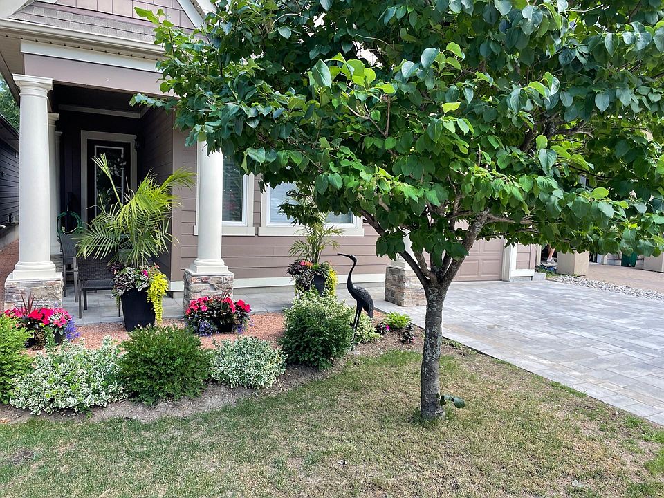 Front of House with new driveway