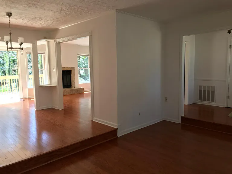 day time open space activities: living room, family room dinning area views.