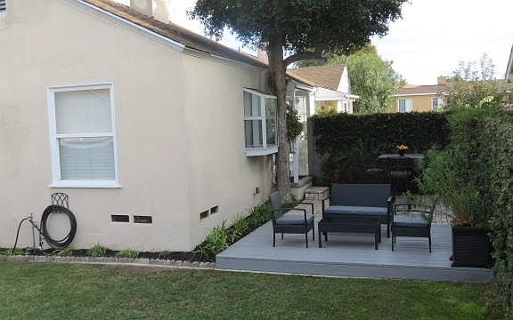 Deck in private yard and livingroom windows.