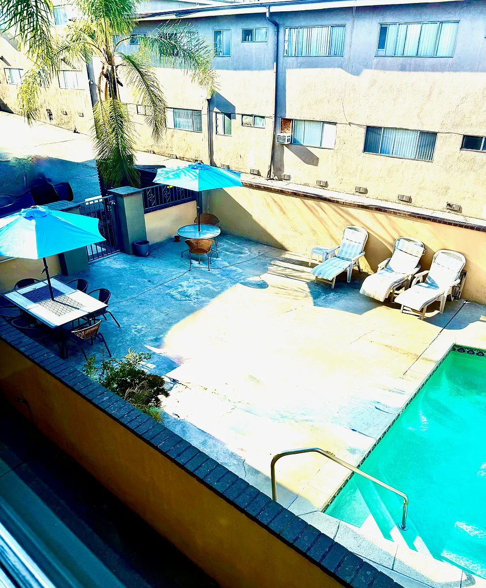 Photo 2 of 15 - 5510 Corteen Pl #14 - Valley Village, CA View of the pool & courtyard. - 5510 Corteen Pl #14