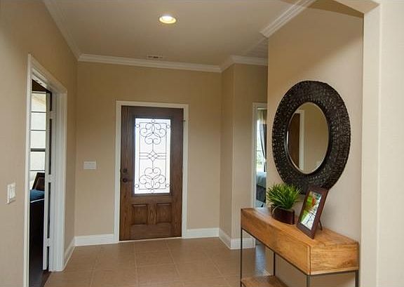 Entry. Photo of Model Home with same Floor Plan, Not of Actual H