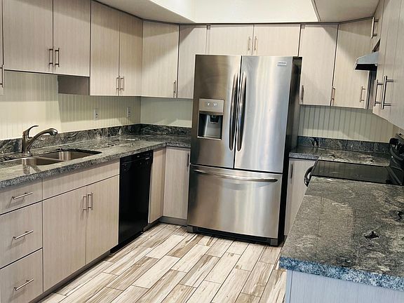 Large upgraded kitchen, viewed from dining area.
