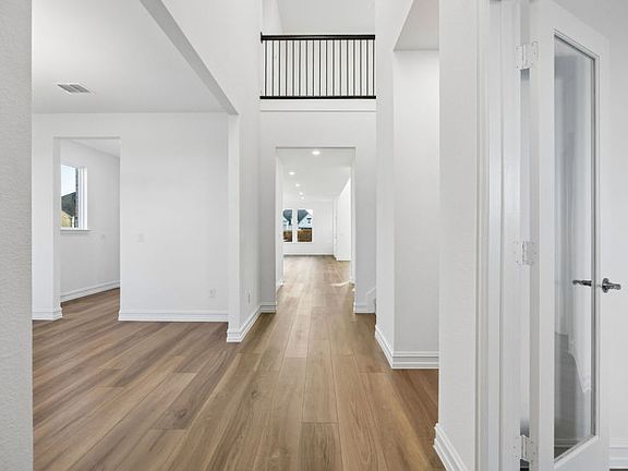 Welcoming entry with soaring ceilings photos may depict options and features that aren t available