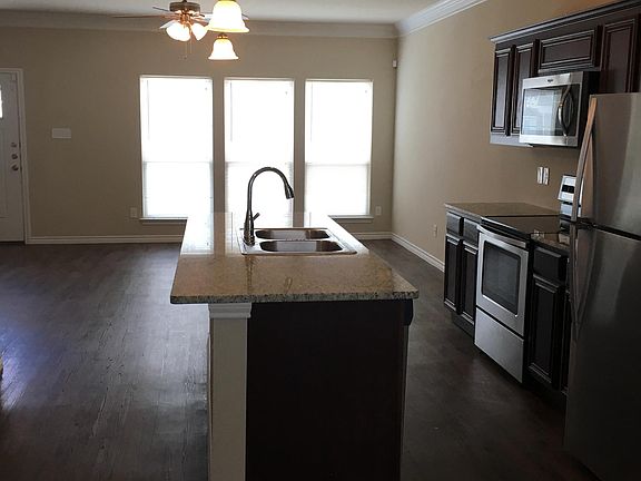 Large open area.  Kitchen has granite counters and stainless
