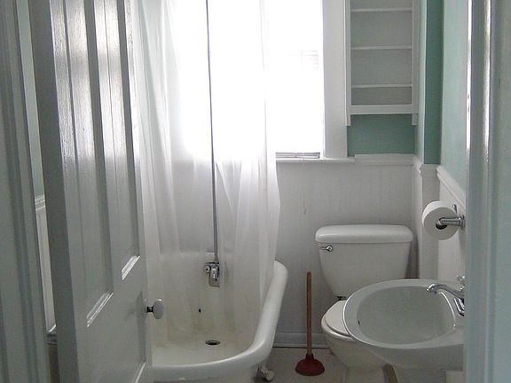 bathroom with claw foot tub