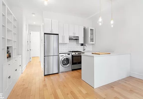2nd image of 212 E 13th St APT 2A