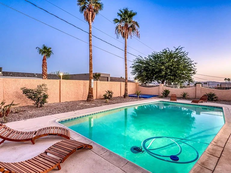 Sparkling deep pool designed to stay cooler during peak summer months.