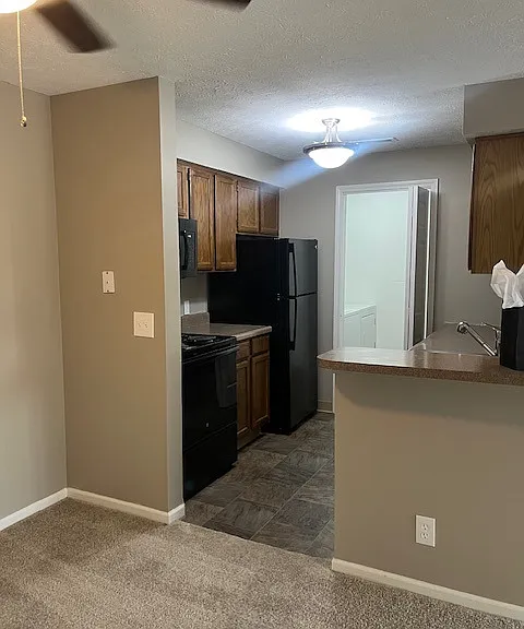 Kitchen/ Laundry Room w/ Full Size Washer & Dryer