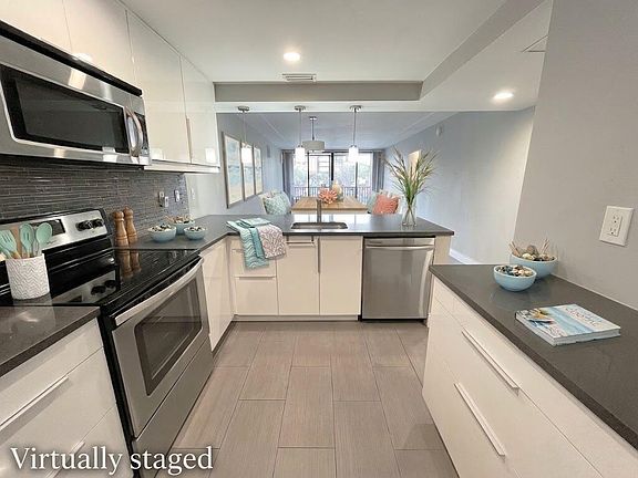 4th image of 3 Royal Palm Way #205