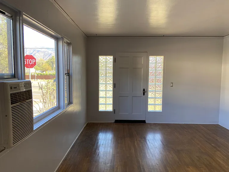 Living room facing front door.