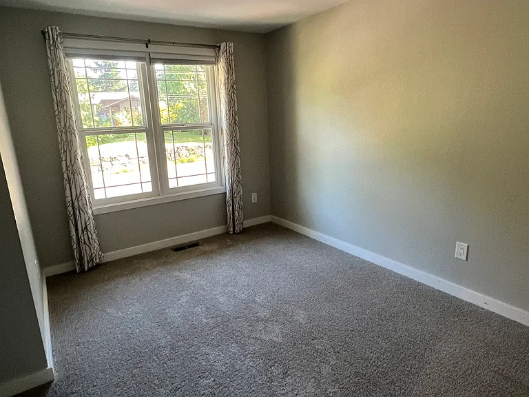 Bedroom 3 with no furniture.