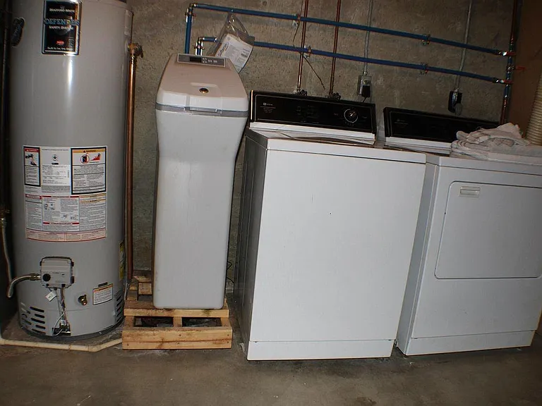 Basement laundry room with water softener