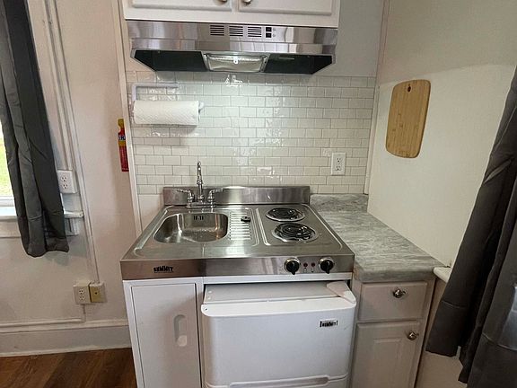 All dishes, utensils, pots and pans included.