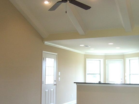 View from front door, into the family room and kitchen.
