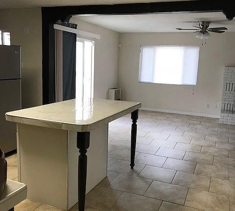 Kitchen looking to Den