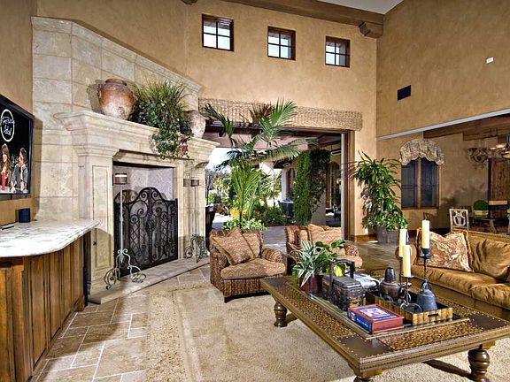 The family room features vanishing doors for indoor/outdoor living