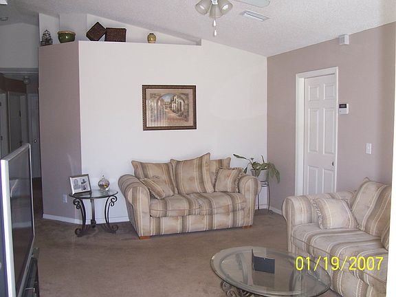 Living Room with Door to Garage