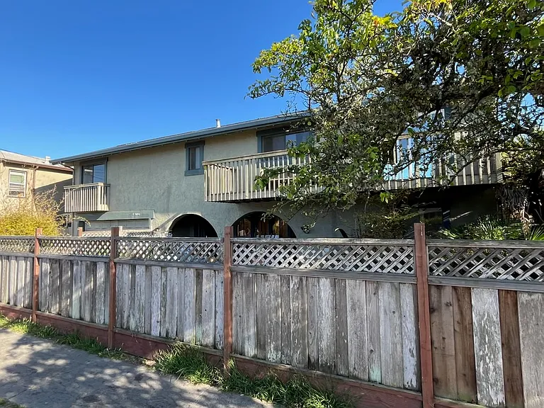 Street view of front fenced garden