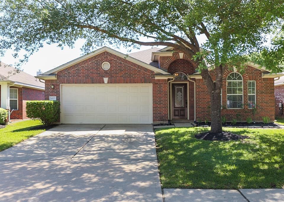 Welcome home to 14622 Windwood Park Lane in the popular subdivision of Cypress Mill Park, which was completely High & Dry during