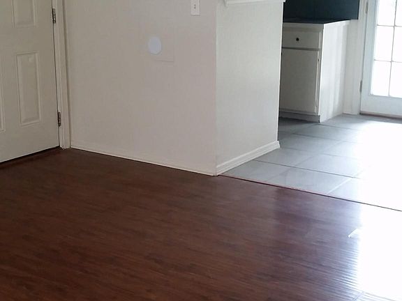 Living looking towards kitchen and dining