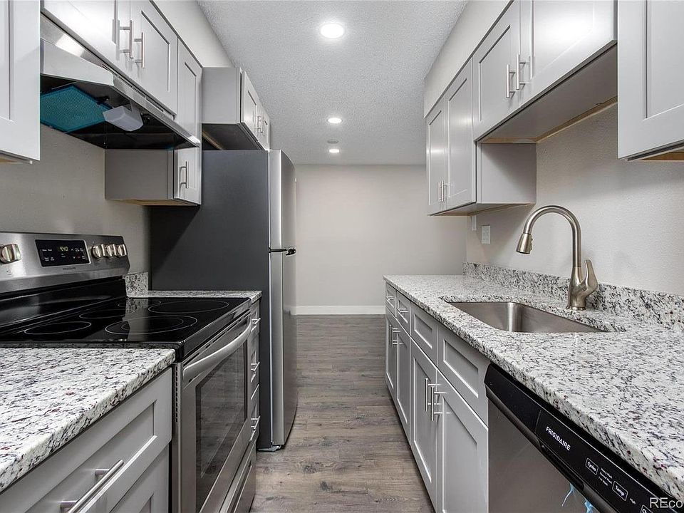 Brand new kitchen with stainless steel appliances, granite countertop and new cabinets