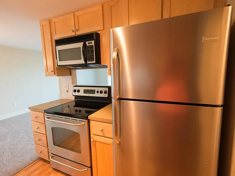 kitchen with brand new refrigerator