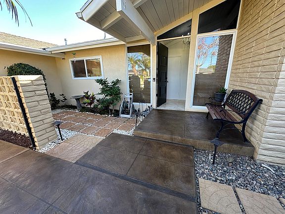 Newly landscaped entrance and stained cement