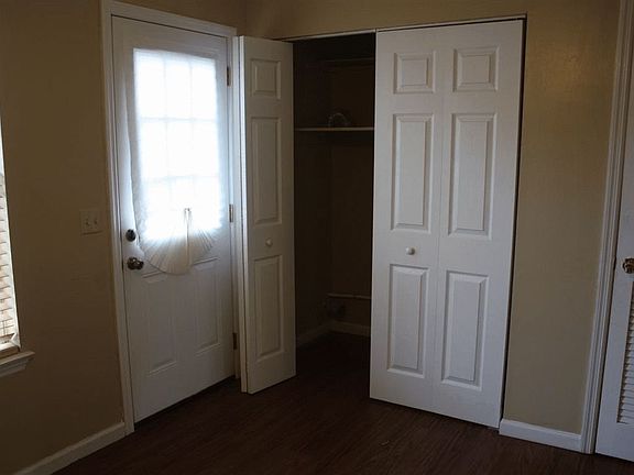 Kitchen Door to backyard and Laundry Room