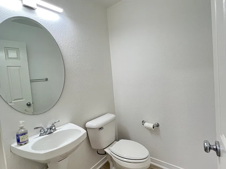 1/2 half bathroom, conveniently located near the kitchen and family room/ formal dining or office.