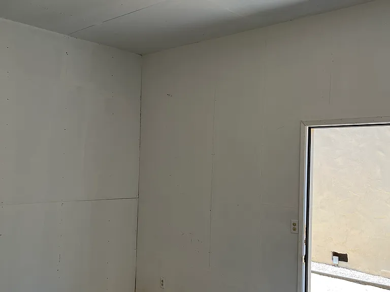 Detached storage/craft room #2 off backyard.