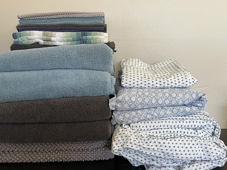100% cotton: towels, sheets, and bathmats.