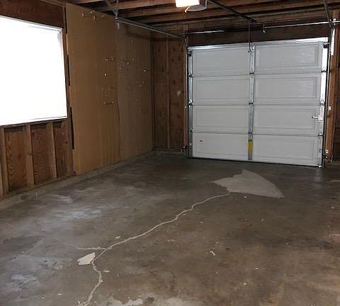 Large single car garage with washer and dryer hook ups (tenant provides own washer and dryer).