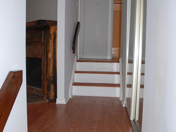 stairway leading to the den and bathroom