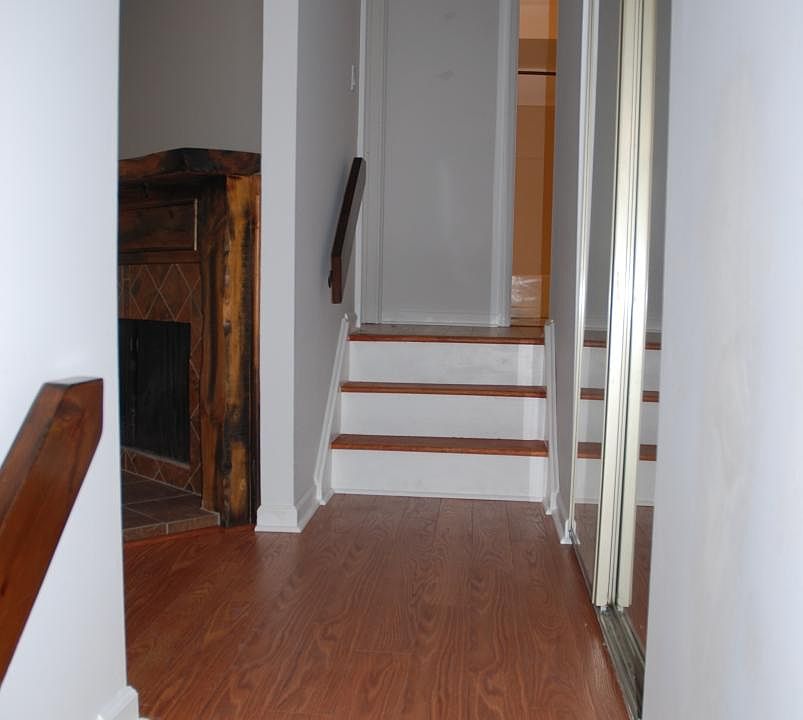 stairway leading to the den and bathroom