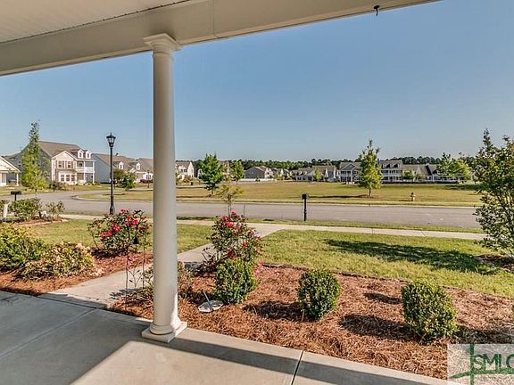 Front porch overlooking green space