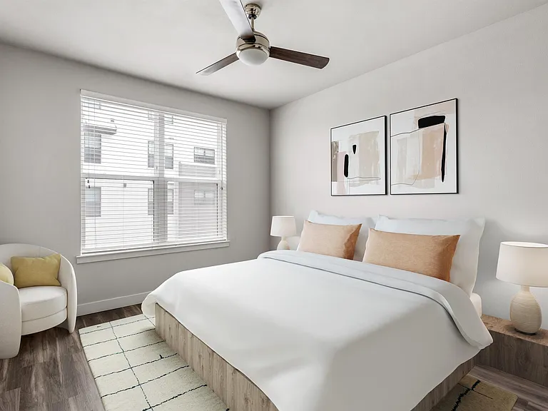 Bright Bedroom with Neutral Decor and Ceiling Fan