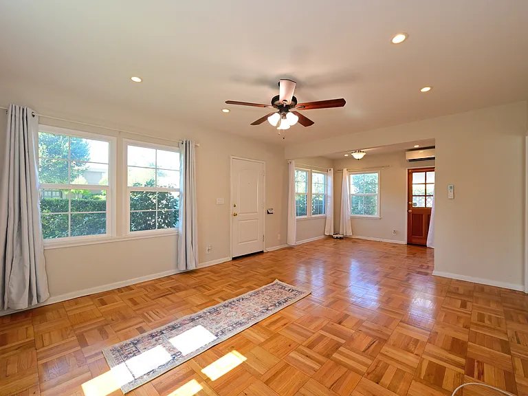fully upgraded and bright w/ parquet hardwood flooring + mini split hvac + in-unit laundry