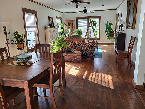 Dining to living area with kitchen to right of camera.